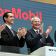 Exxon Chairman and CEO Darren Woods, third from left, joins the applause during opening bell ceremonies at the New York Stock Exchange in 2017. Oh, how times have changed.